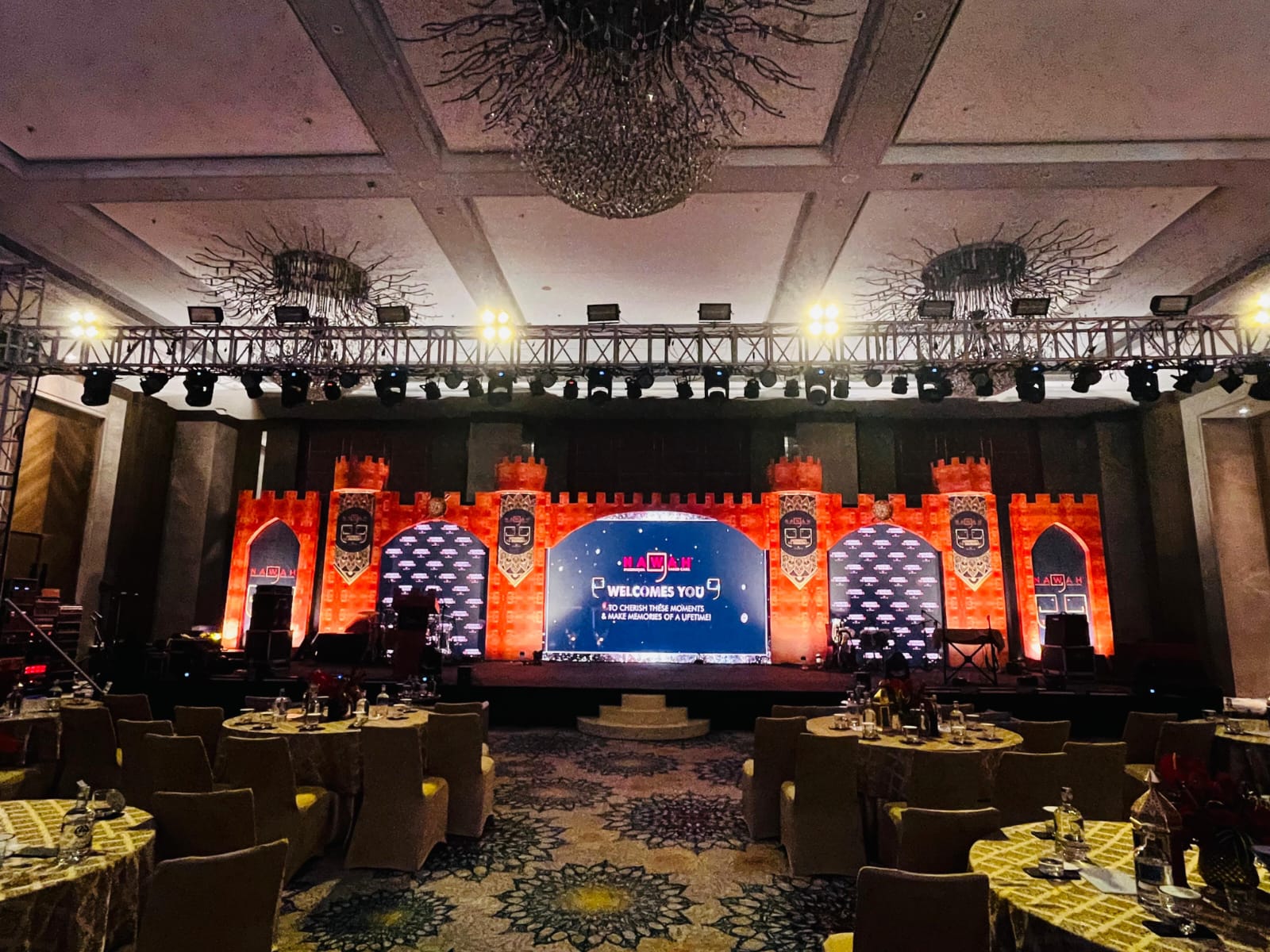 Indoor gala event stage with warm lighting
